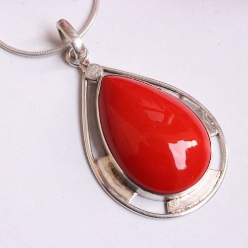 Artisan red coral stone silver pendant