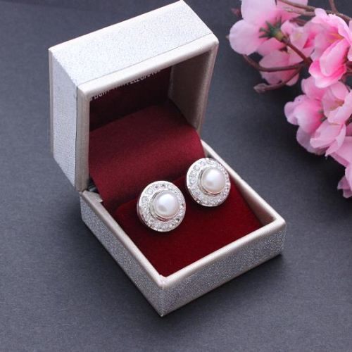 Real pearl stud earrings with diamante accents