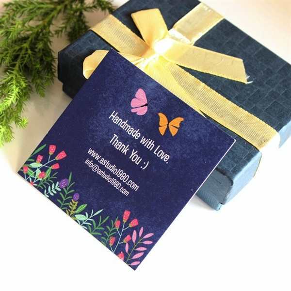 Green gemstone drop flower earrings